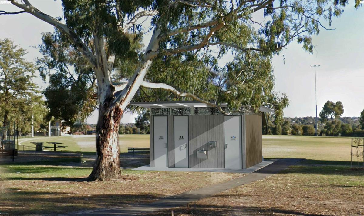 Three toilet cubicles beside a tree at Donvale Reserve