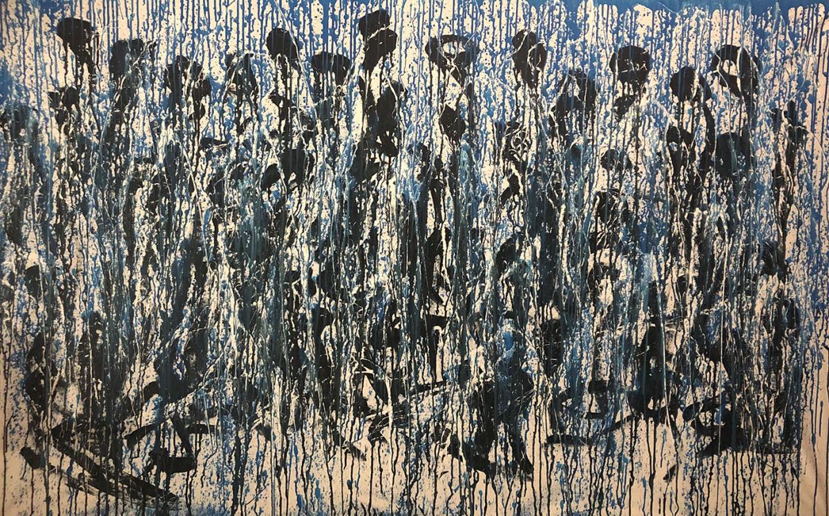 blue and black splatters and drips on canvas