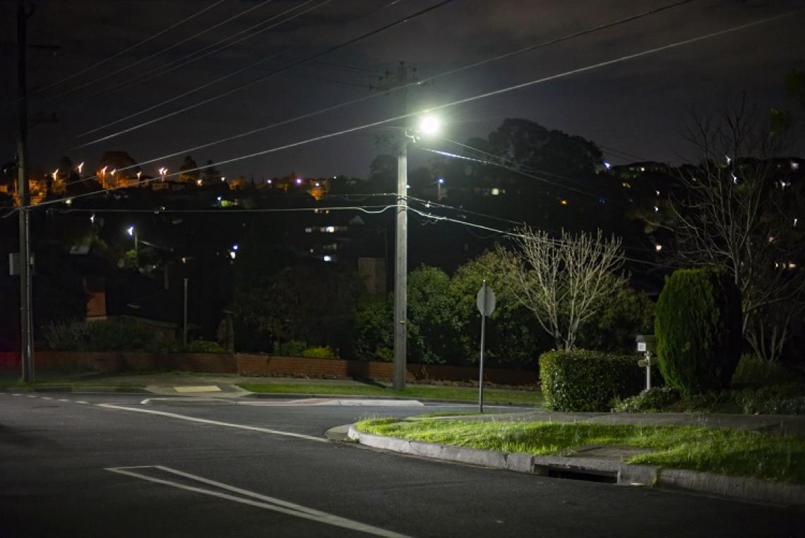 Photo of Bulleen Corner crosswalk at night with streetlight on