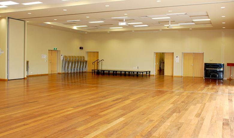 Ajani Centre Main Hall Stage and entry doors from Supper room