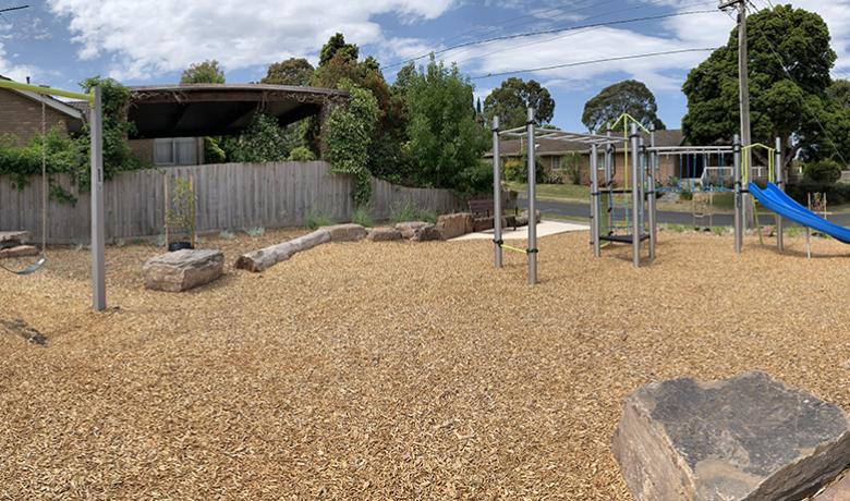Swing set, tan bark and playground at Gainsborough Reserve 