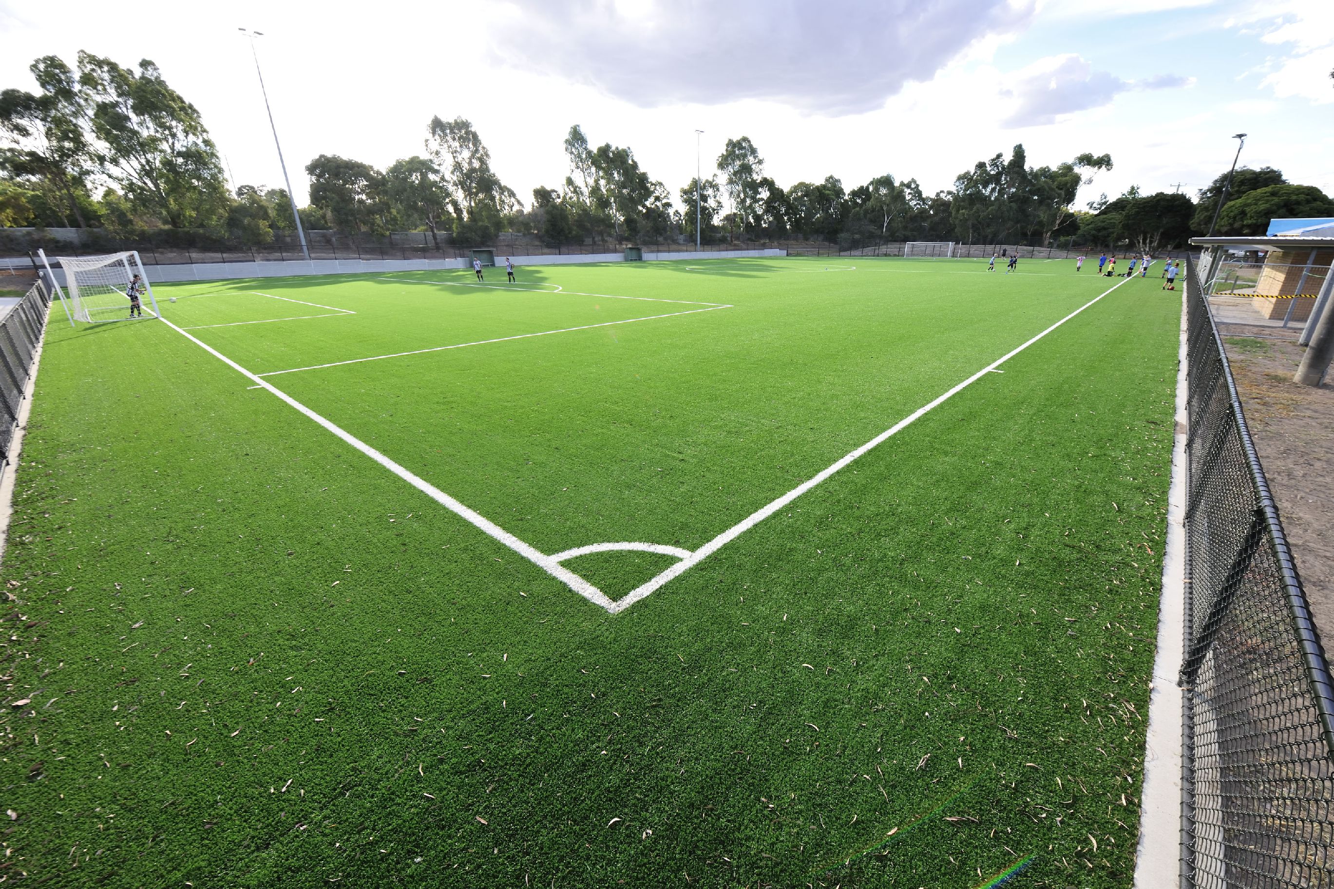 Wide angle photo of a soccer field