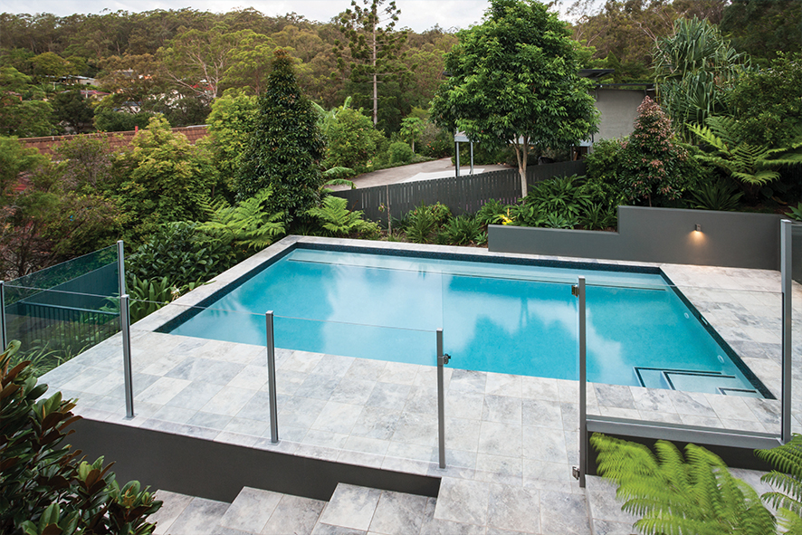 Backyard pool with safety fence
